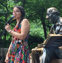 MaryAnnSchmidt telling stories at the Hans Christian Andersen statue